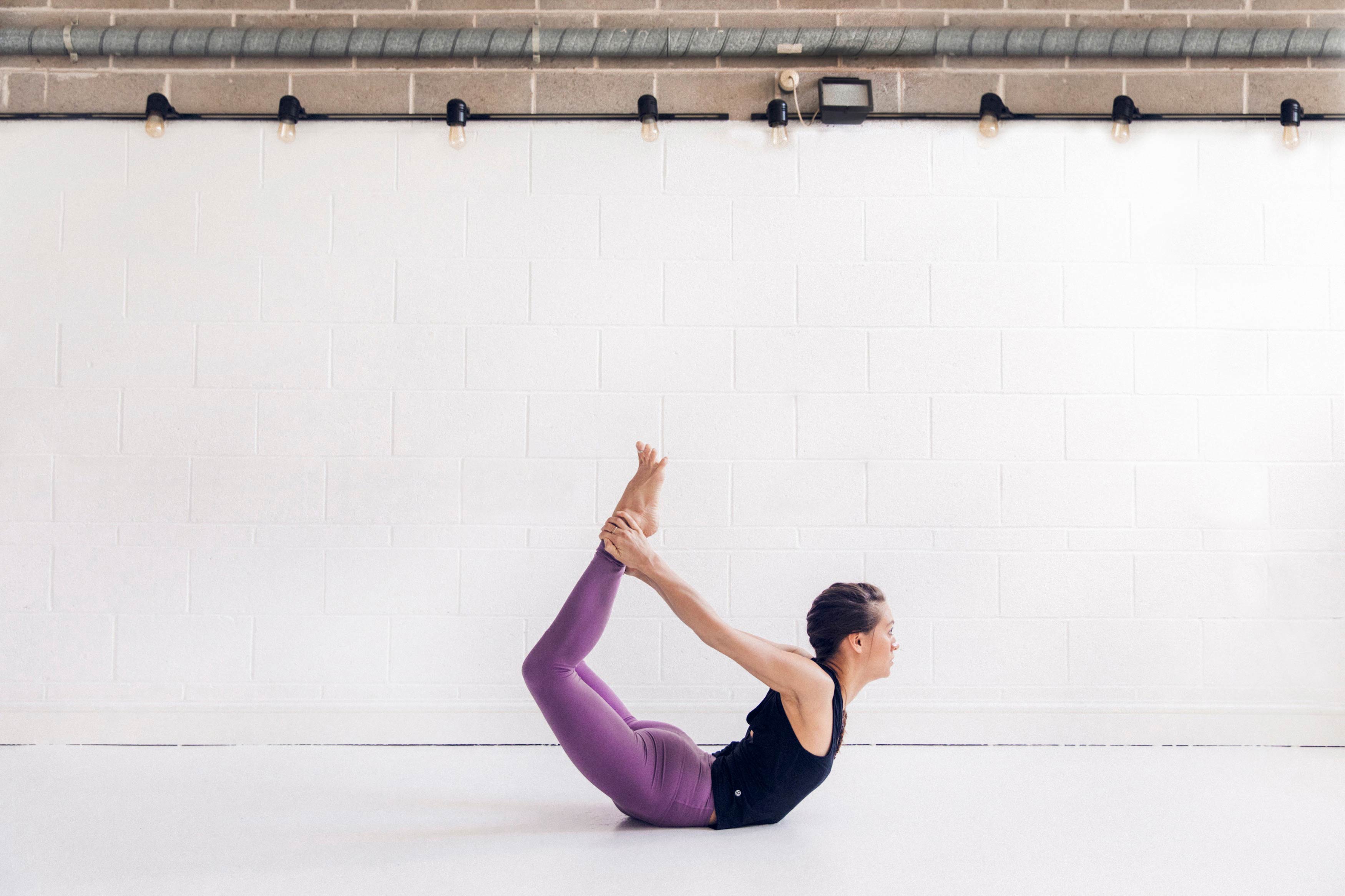 12 Advanced Yoga Poses That Are Fun to Look At (and Even More Fun to Do)